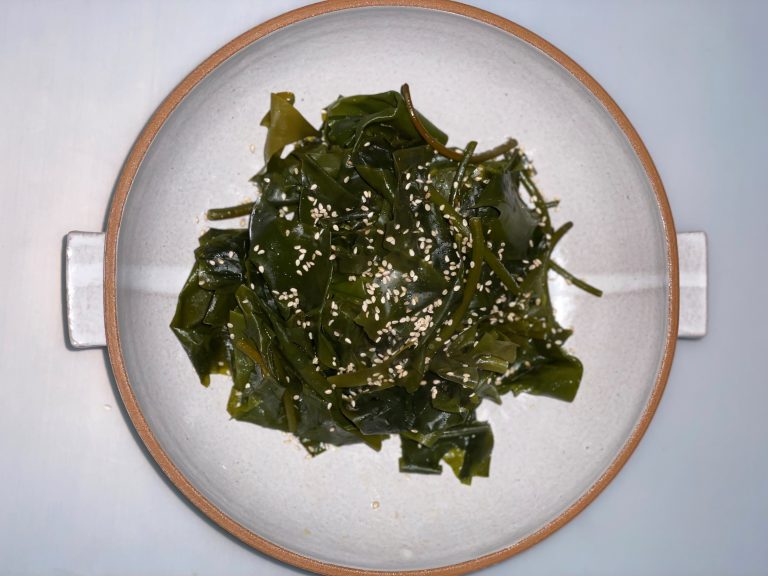 A plate of sugar kelp prepared for a meal.