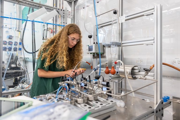 A student works with high-tech equipment in a laboratory.