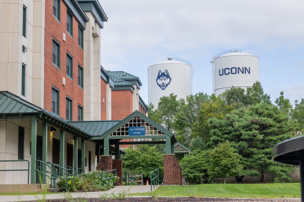 The UConn-branded water towers sits behind the Towers residence halls