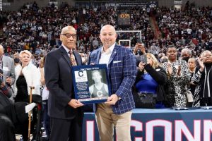 Harrison Brooks Fitch Jr. '64 and UConn Director of Athletics David Benedict.