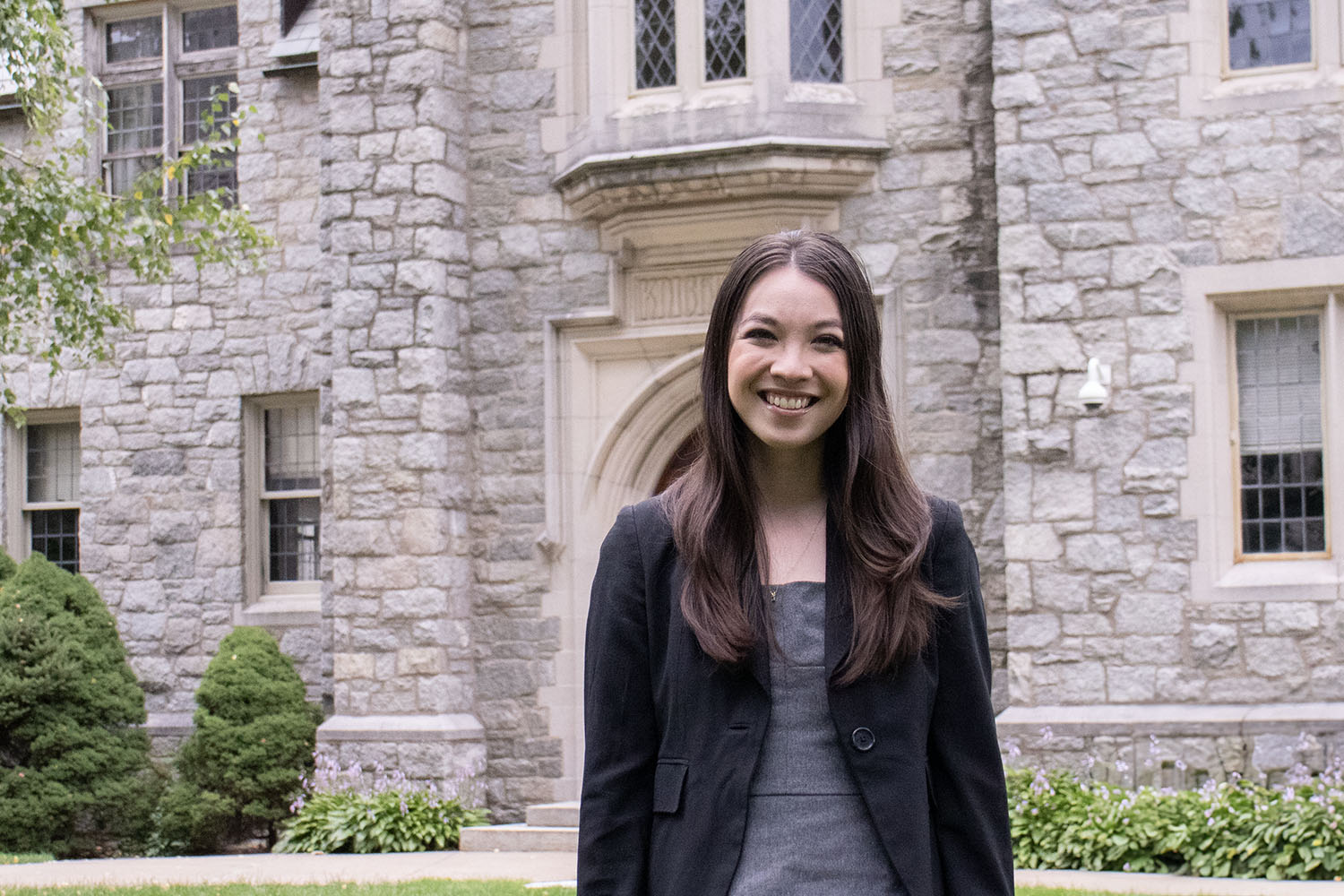 Alexandra Prendergast stands in front of Knight Hall.