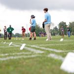 Attendees at the 2024 Turfgrass Field Day hear about the latest research in the field of turfgrass at UConn's Plant Science Research and Education Farm (Jason Sheldon/UConn Photo)