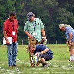 Attendees at the 2024 Turfgrass Field Day gain hands on experience at UConn's Plant Science Research and Education Farm