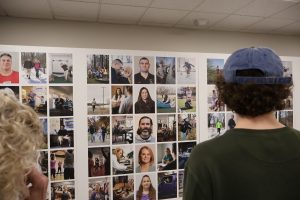 Students and community members were among those that visited "The Stories We Live" photo exhibit at E.O. Smith High School.