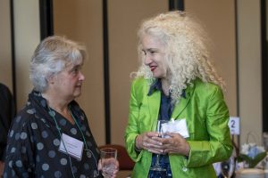 UConn President, Radenka Maric talking with NAS member Laurinda Jaffe, Board of Trustees Distinguished Professor, at the UConn National Academy of Sciences Celebration.