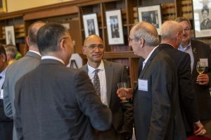 Executive Vice President for Health Affairs and Chief Executive Officer for UConn Health, Andrew Agwunobi, talking with attendees at the UConn National Academy of Sciences Celebration.