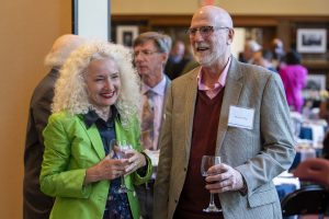 UConn President Radenka Maric talking with Board of Trustees Distinguished Professor of Ecology and Evolutionary Biology Professor Michael Willig at the UConn National Academy of Sciences Celebration.