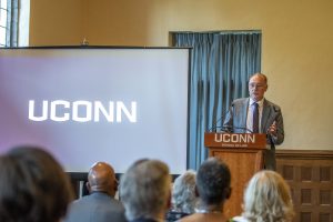 Pamir Alpay, Vice President for Research, Innovation, and Entrepreneurship speaking at the UConn National Academy of Sciences Celebration at the UConn School of Law.