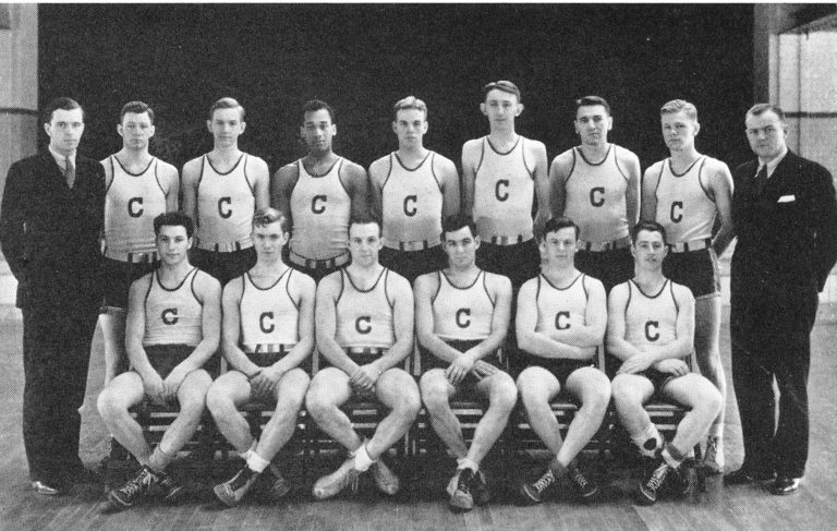 A photo of the UConn men's basketball team in the early 1930s, with Harrison Fitch, the first Black basketball player.