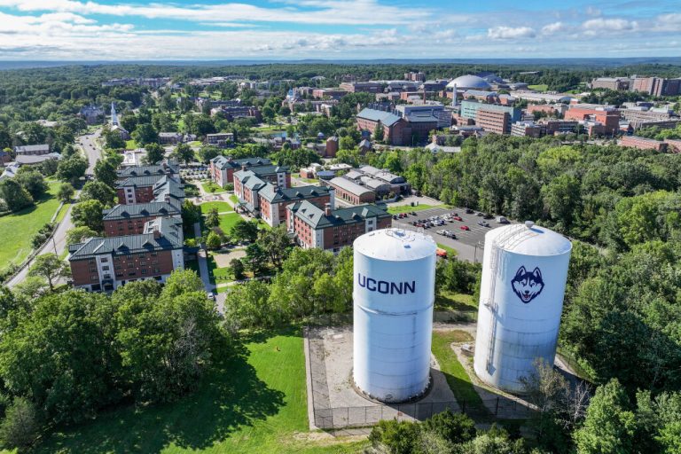 An aerial view of campus from the north on a sunny day in Storrs on Aug. 20, 2024. (Sydney Herdle/UConn Photo)