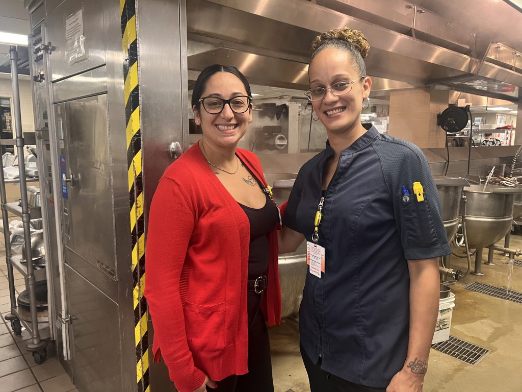 Ashley Sepúlveda and Lily Paradis in the main kitchen at UConn Health this Hispanic Heritage Month.