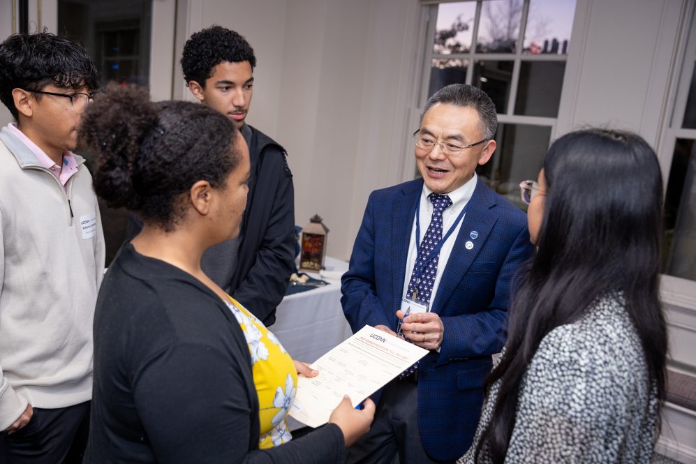 Dean JC Zhao with students.