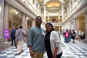 Man and woman posing for a photo