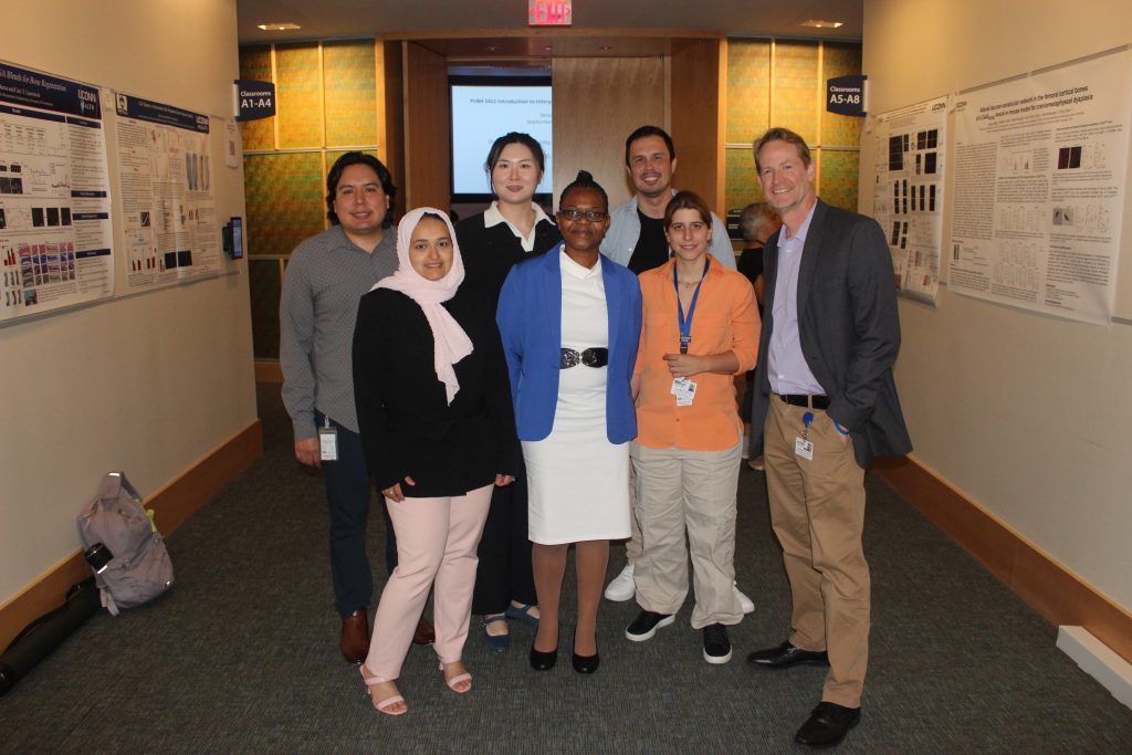 • Postdoc Research Day Organizing Committee. From the left, top: Drs. Alexander Calderon, Ying Tang, Anvar Sariev, Sama Abdulmalik, Patience Shumba, Chrysoula Argyrou & Chris Heinen (not shown: Zeynep Altunay)