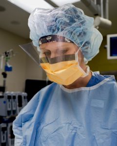 physician assistant in scrub in the operating room