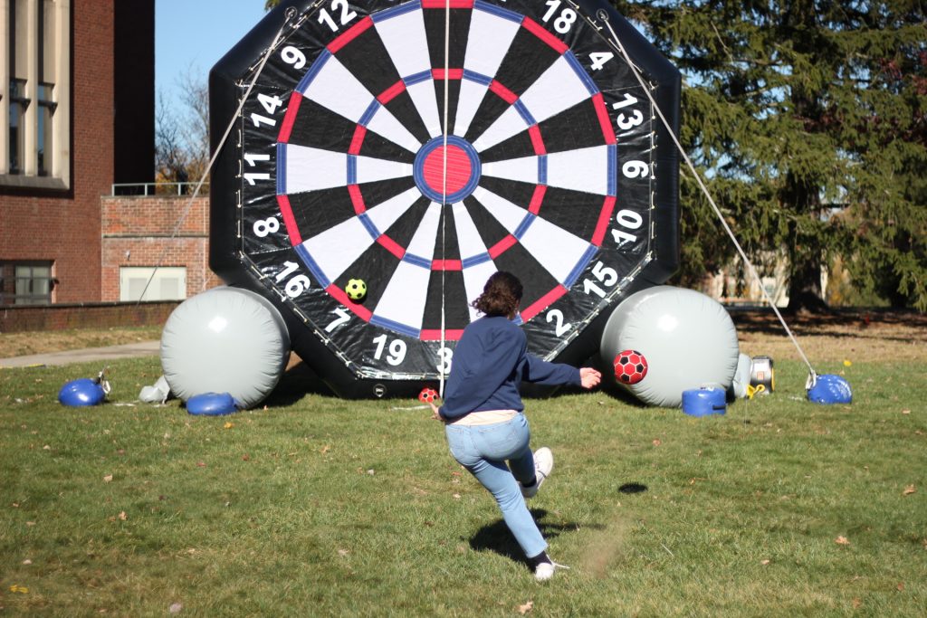 A student plays one of the games held during Homecoming.