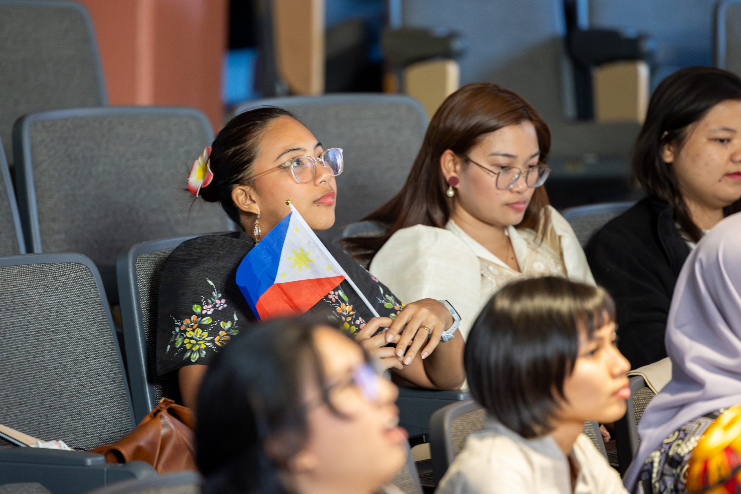 Participants in the Young Southeast Asian Leaders Initiative (YSEALI) hold a cultural fair in Monteith Building