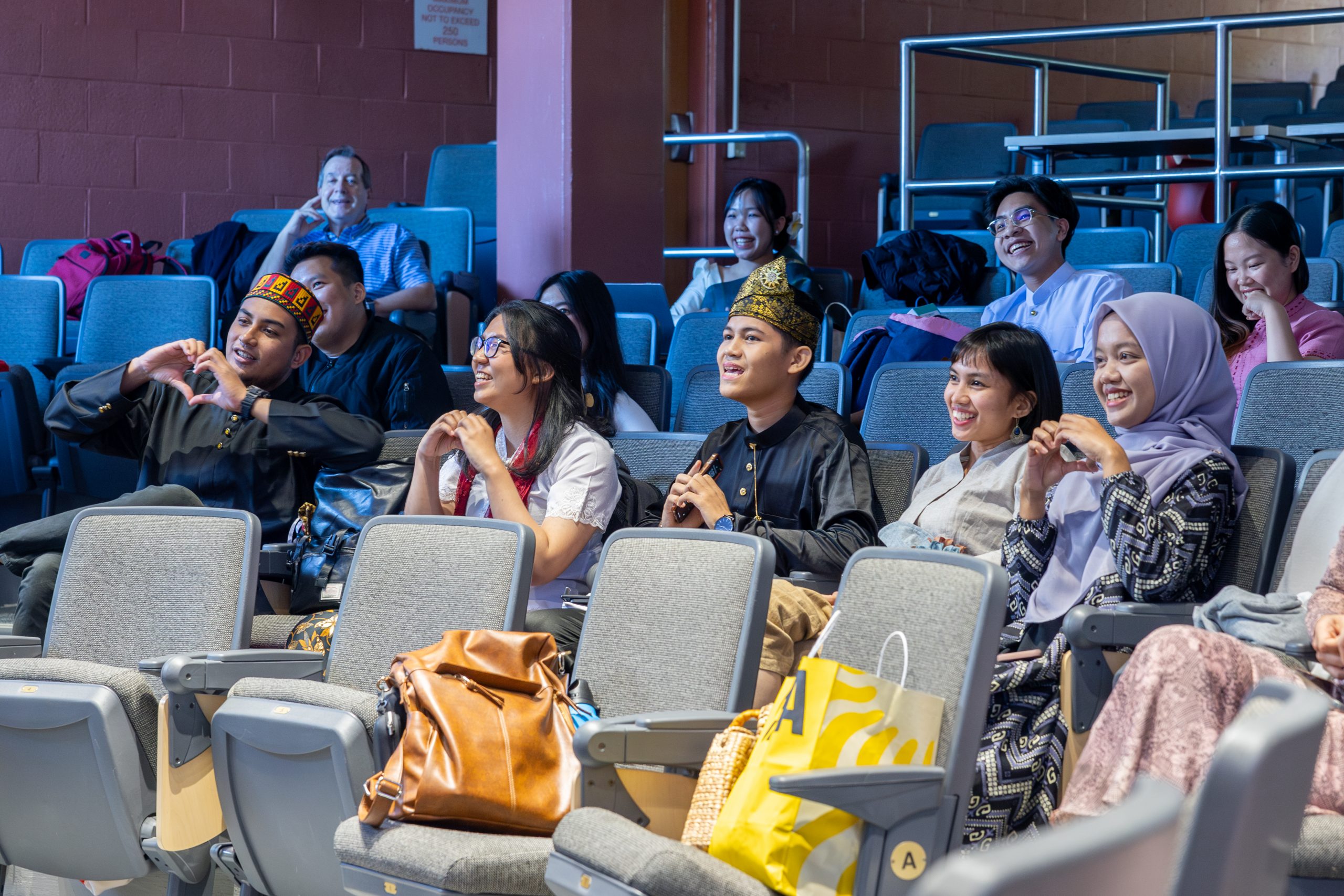 Participants in the Young Southeast Asian Leaders Initiative (YSEALI) hold a cultural fair in Monteith Building.