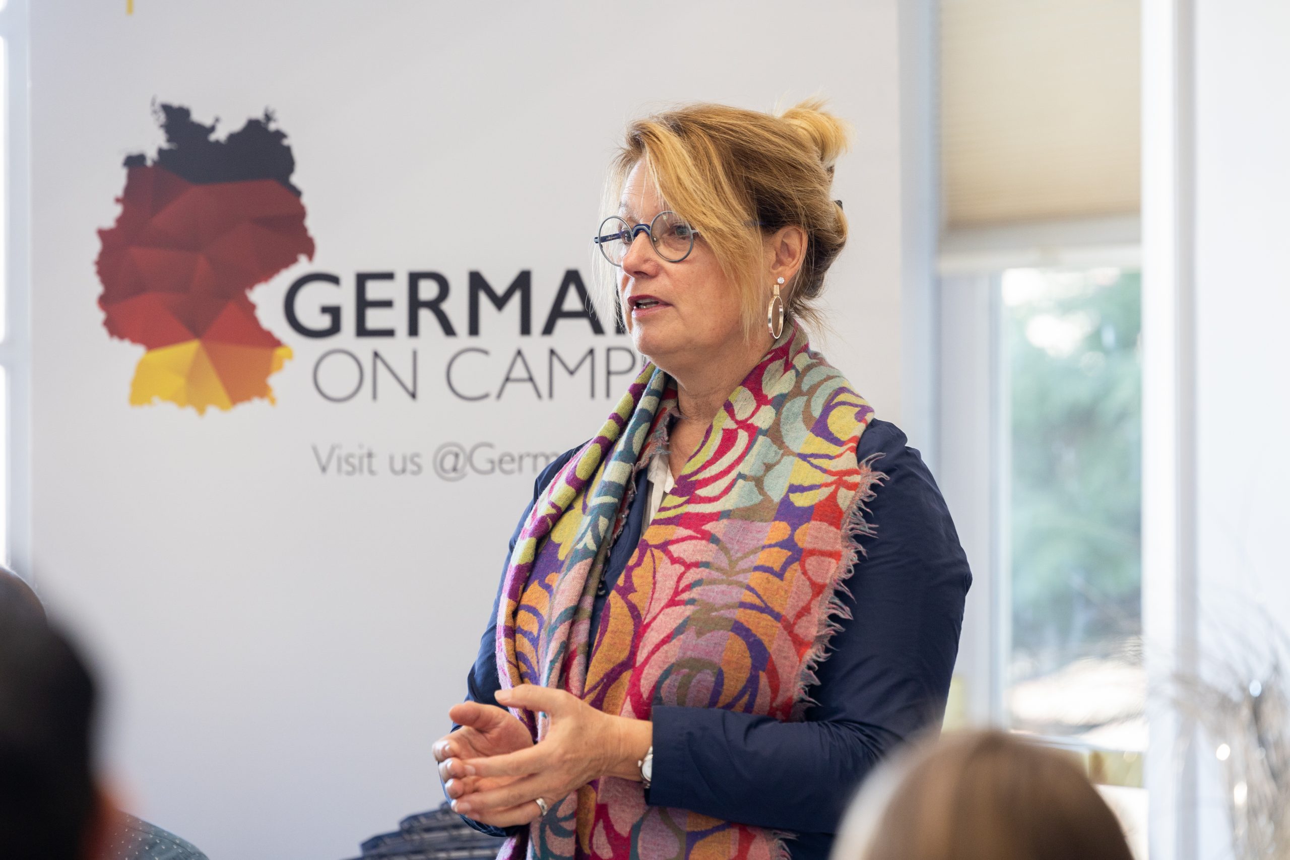 Anke Finger, director of the graduate program in German studies at UConn and co-director of EUROBIZ and EUROTECH, speaks during the Germany on Campus summit in the Alumni Center.