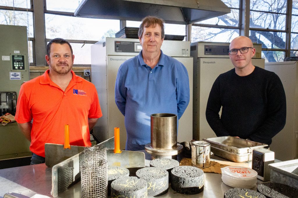 Scott Zinke, James Mahoney, and Alexander Bernier with pavement samples.