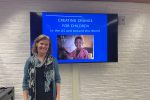 Human rights activist Jo Becker stands in front of a screen showing her presentation.