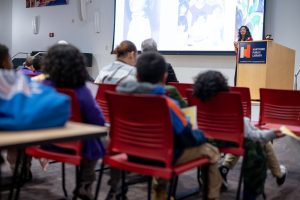 Author Aida Salazar speaks to a group of third-grade student from the Naylor School in Hartford at an event at the Hartford Public Library