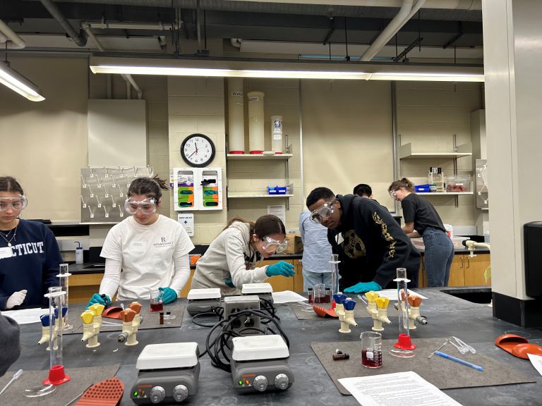 For MolQ Day, high school students explored concepts of quantum physics with hands-on activities in the lab. In one experiment they synthesized gold nanoparticles to demonstrate aspects of quantum confinement.