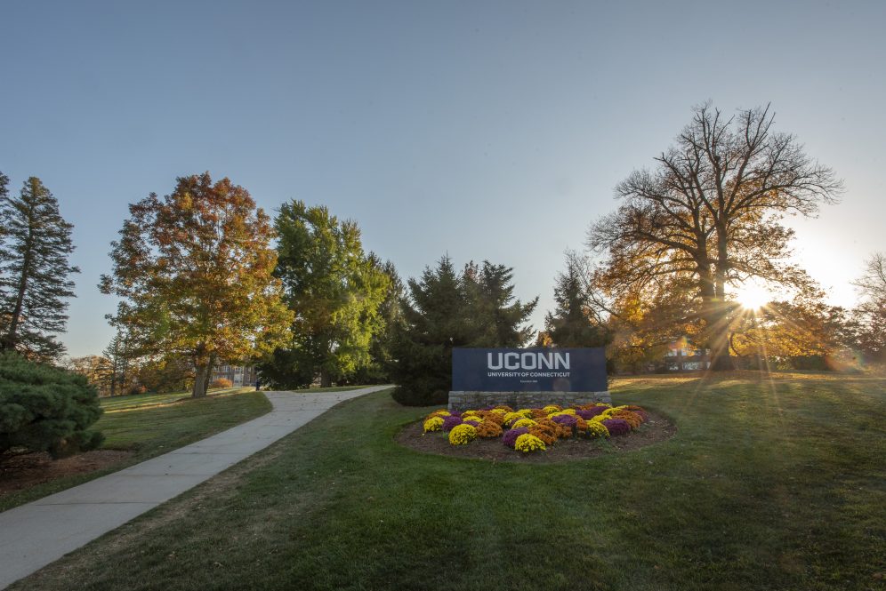 UConn entryway sign during the fall season