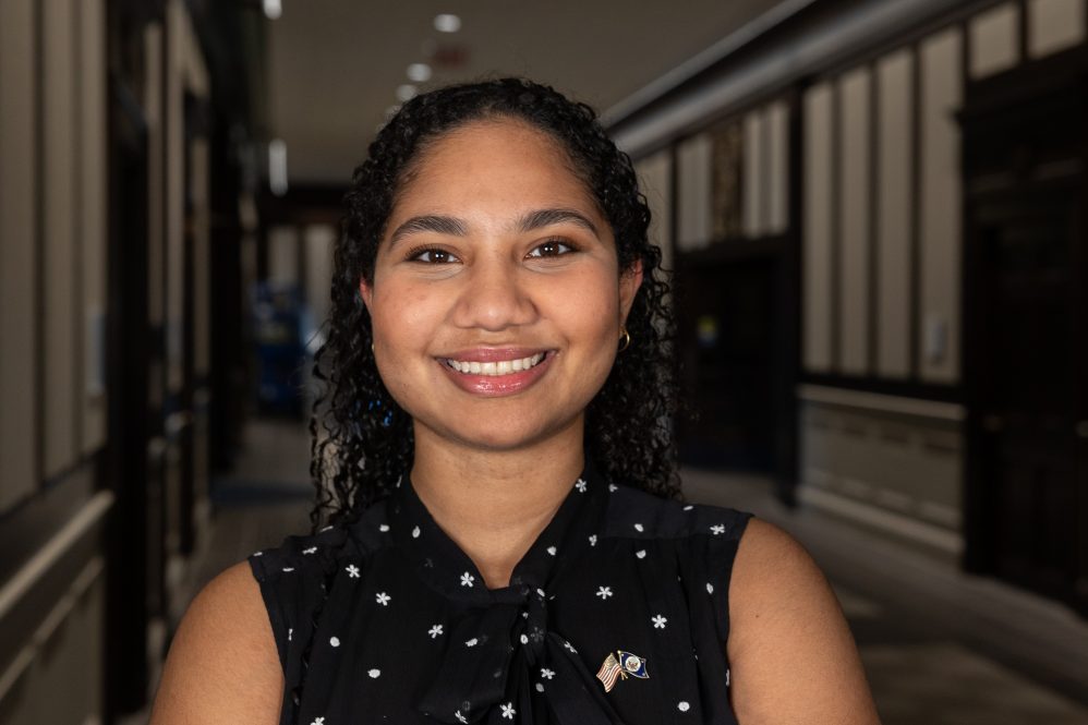 Mariam Vargas '25 (CLAS) poses for a photo in Wilbur Cross