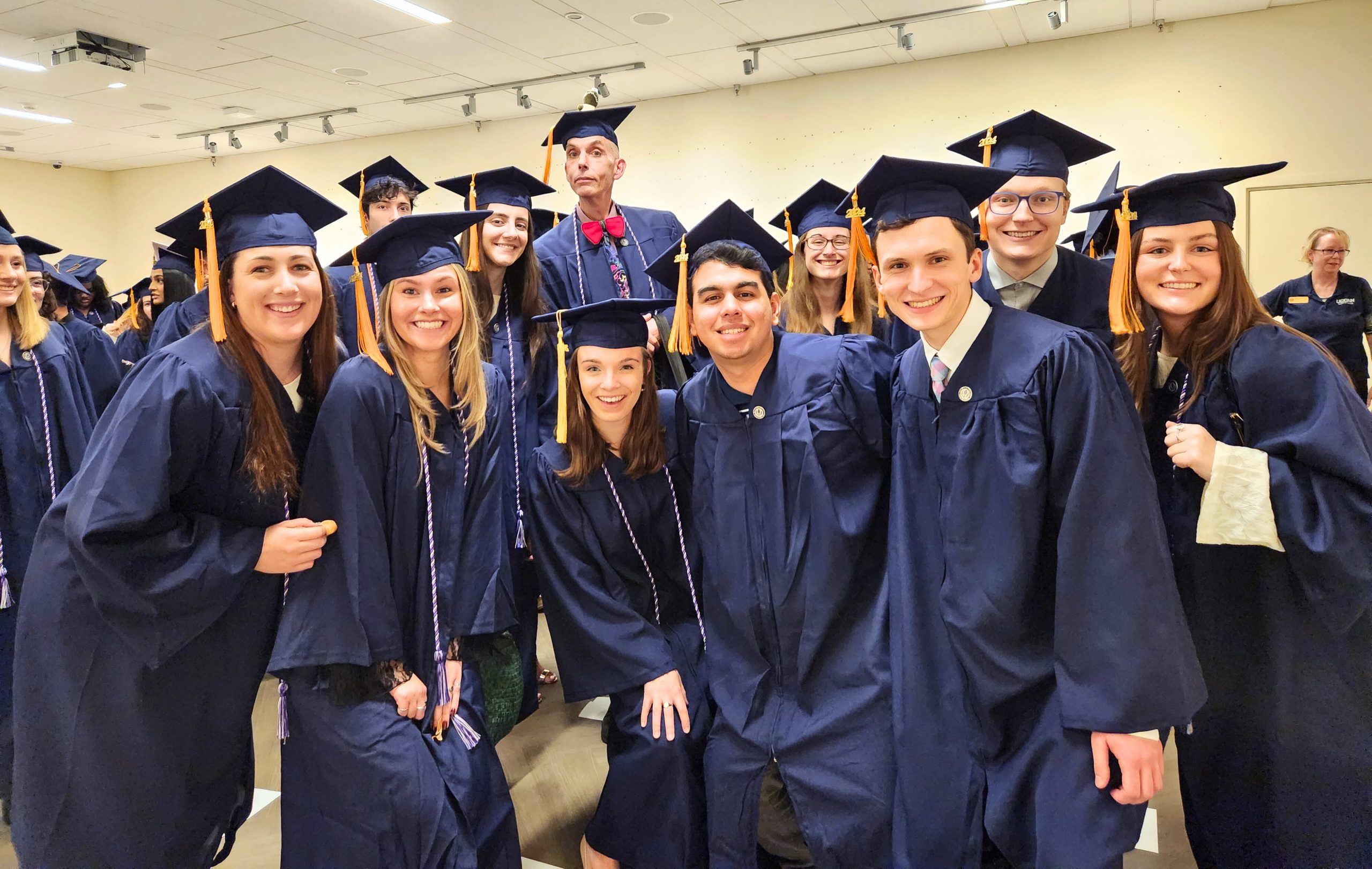 BS/CEIN nursing students lining up before 2024 commencement ceremony