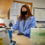 Alyza Barbieri '21 (CLAS) works at the Connecticut Veterinary Medical Diagnostic Laboratory on April 7, 2021. (Peter Morenus/UConn Photo)