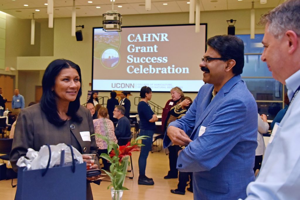 Chief of Staff Michelle Williams (left), CAHNR Associate Dean for Research and Graduate Education Kumar Venkitanarayanan (center), and Head of the Department of Pathobiology and Veterinary Science Paulo Verardi (right)