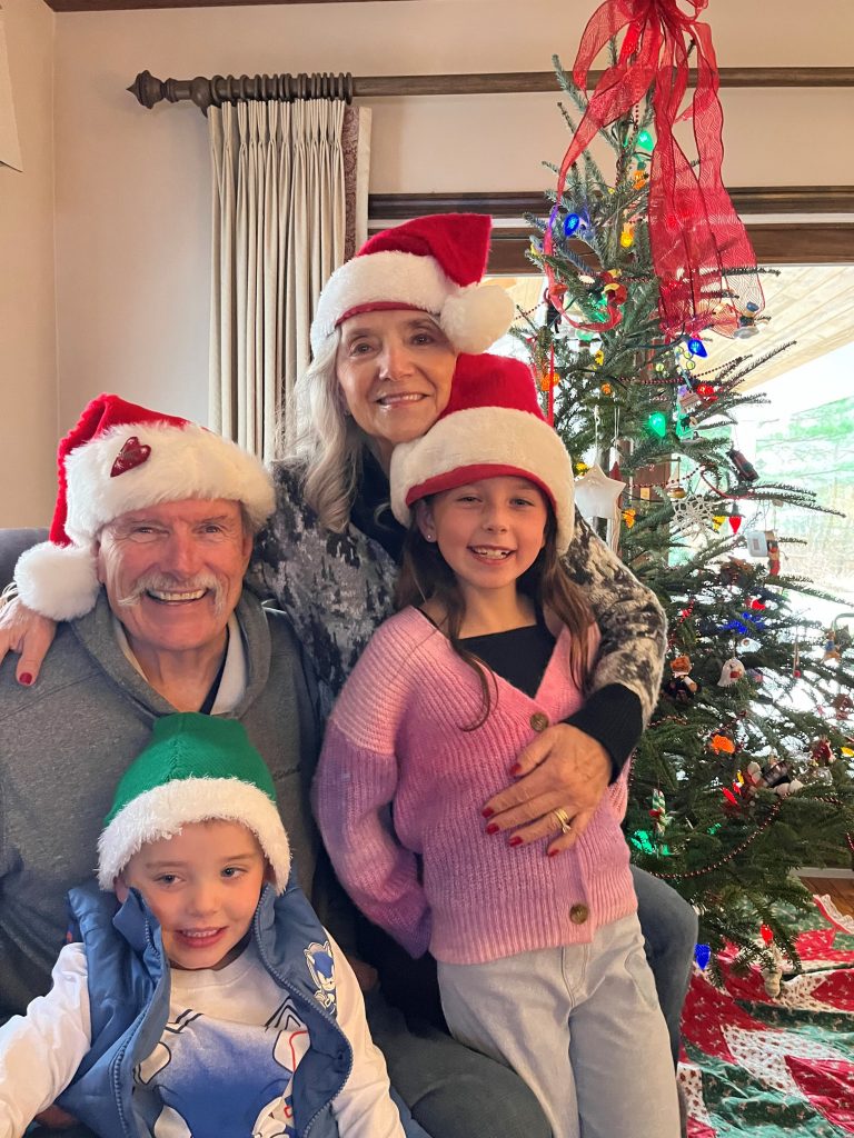 Norm with his wife Charlene and his grandchildren (Photo courtesy of Kilcomons family).