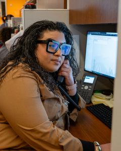 Meiling Ortiz speaking on a desk phone