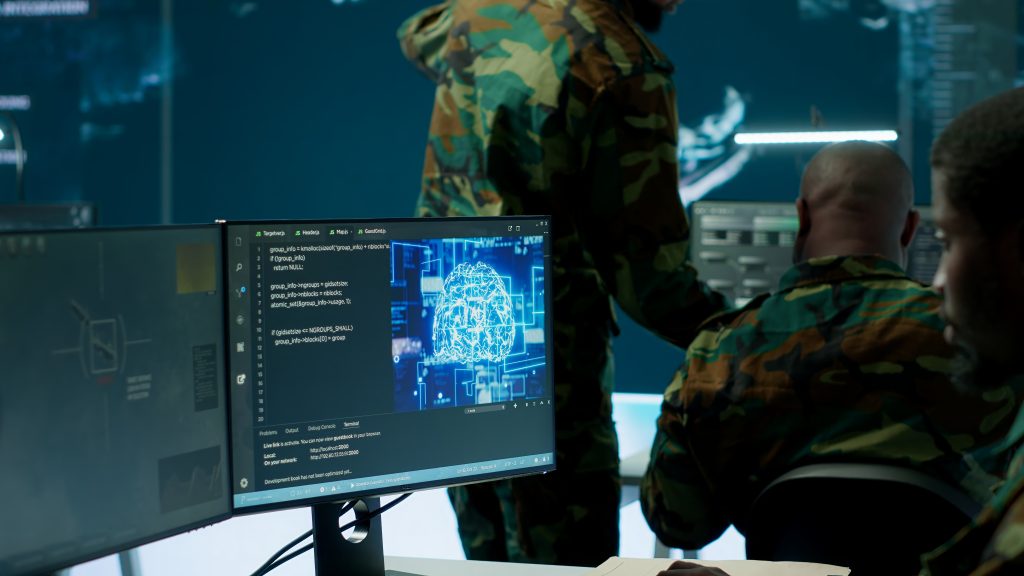 Military personnel working with computers.