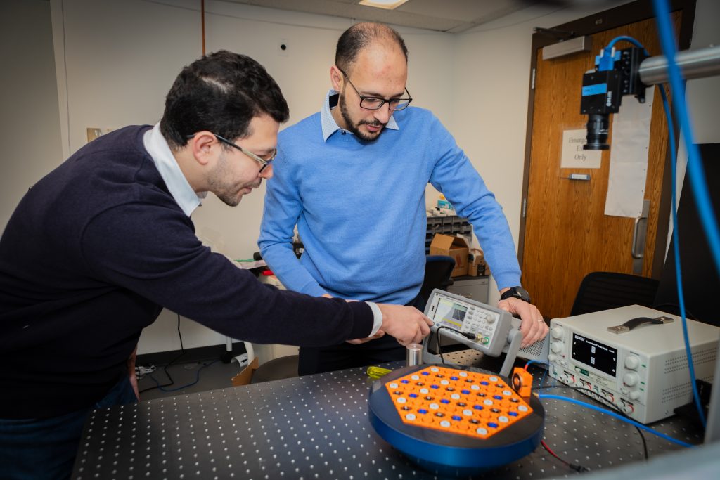 Researchers working on soundwave technologies.