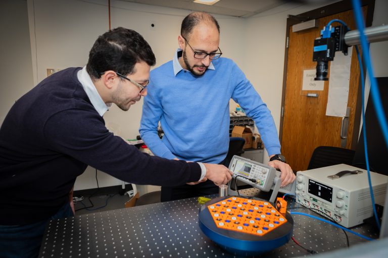 Researchers working on soundwave technologies.