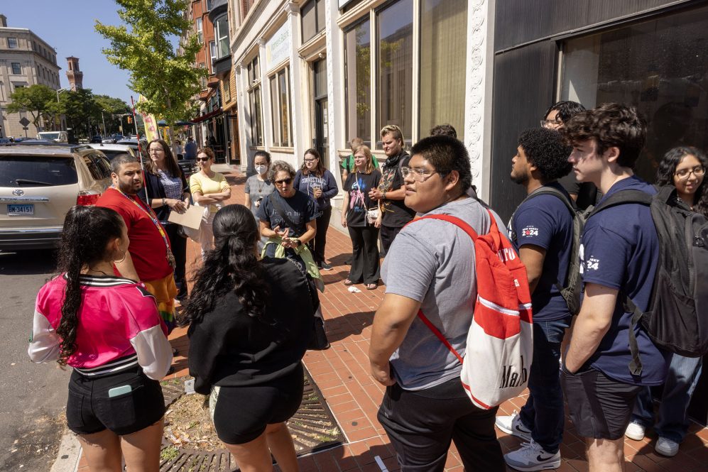 Waterbury Walkbury.  Students walking around Waterbury, CT. visiting local businesses and City Hall