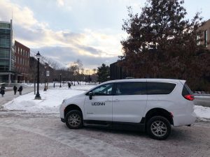 An AVS van driving on the UConn campus