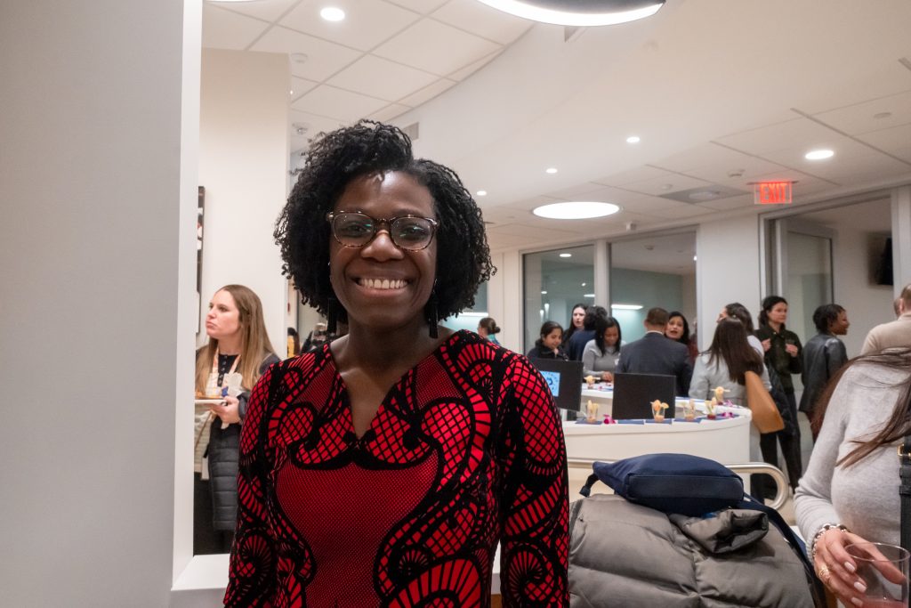 Sickle cell patient Lola Odesina celebrating at the Institute's grand opening.