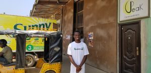 UConn Anthony Mensah poses for a photograph during a food drive in Accra, Ghana.