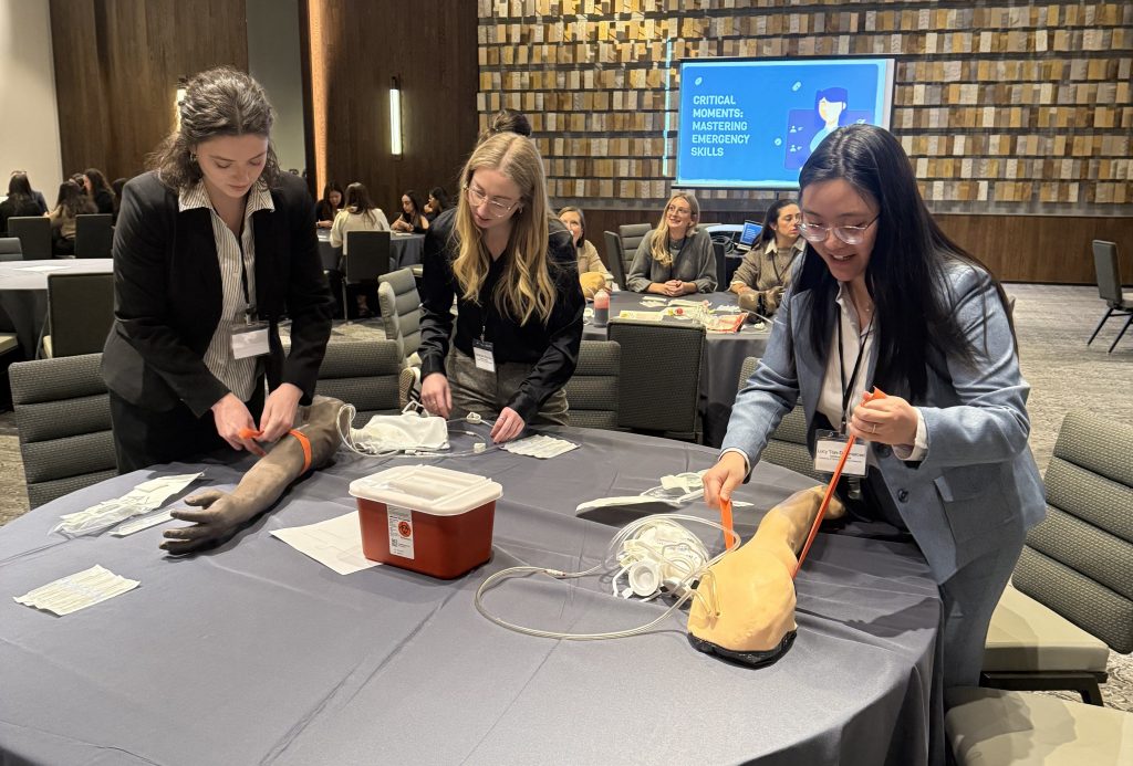 Hands-on clinical skills training workshops were also held at the event. (Photo by Olivia Kuk/Boston University medical student).