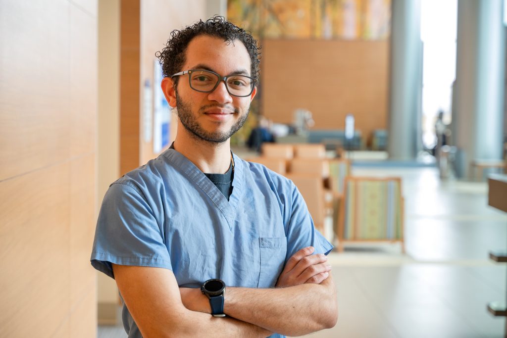 Surgical resident Dr. Edison Martinez Monegro at UConn John Dempsey Hospital (Tina Encarnacion/UConn Health Photo).