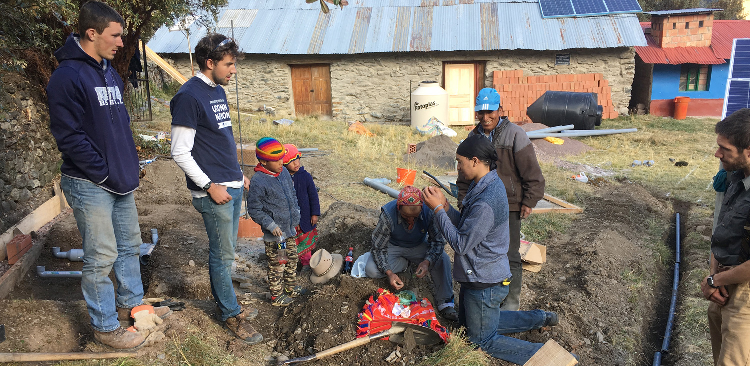 UConn students from the University chapter of Engineers Without Borders participate in a ceremony honoring Mother Earth with local community leaders in Cusco, Perú. 