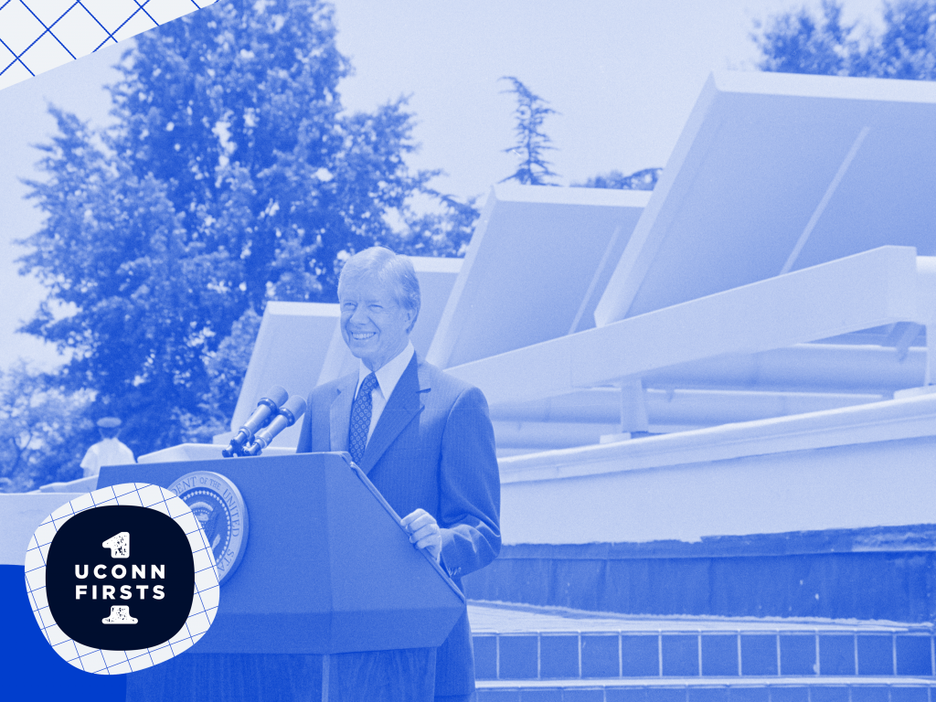 President Jimmy Carter standing in front of the White House's first solar panels