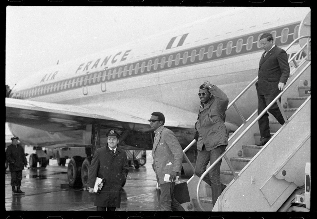 American civil rights activist Stokeley Carmichael gets off a plane in Paris in 1967.