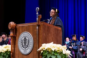 Lucinda Canty giving a speech to graduating CEIN/BS students (photo provided by Defining Studios)