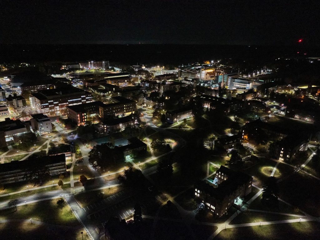 Drone shot of Storrs campus at night