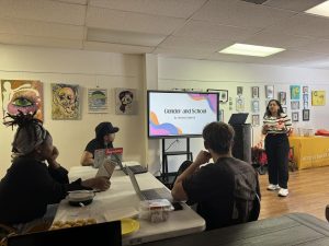 Students listen to a presentation at UConn Waterbury