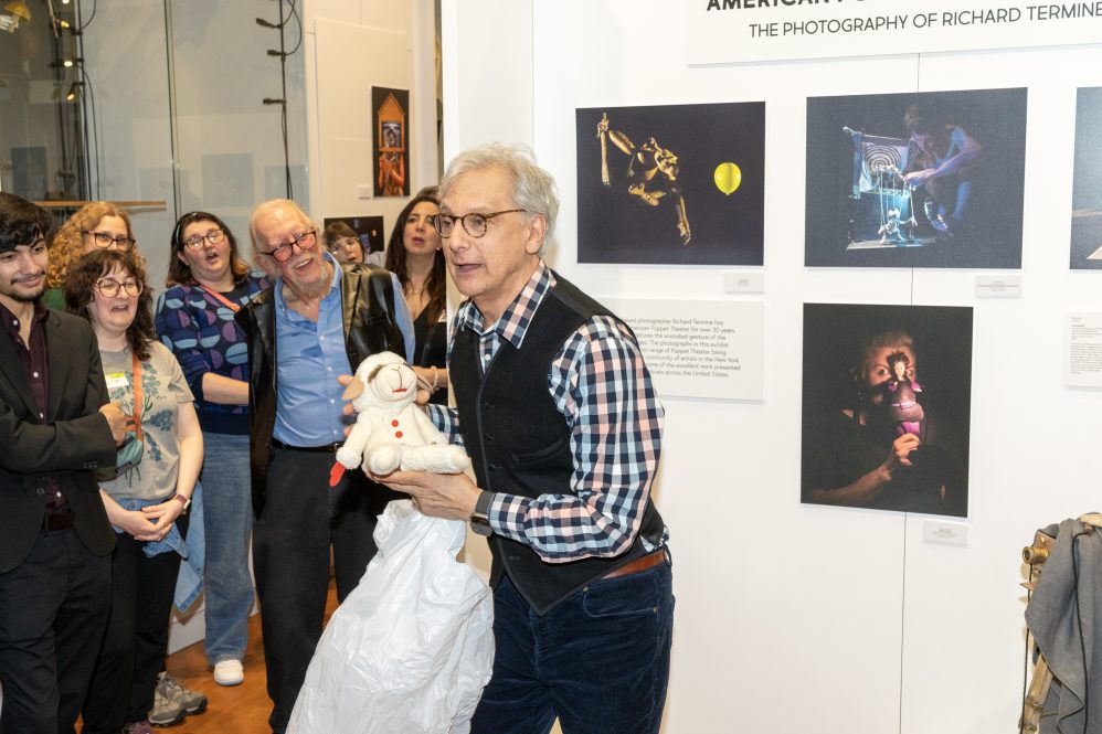 Photographer Richard Termine ’75 (SFA), ’78 MFA talks to a crowd of people